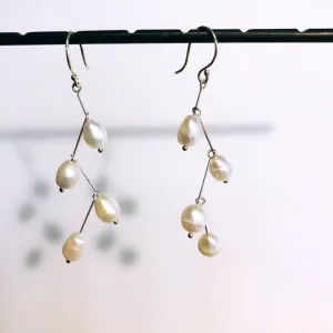 Waterfall white pearls earrings