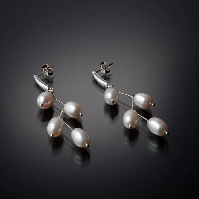 Waterfall white pearls earrings